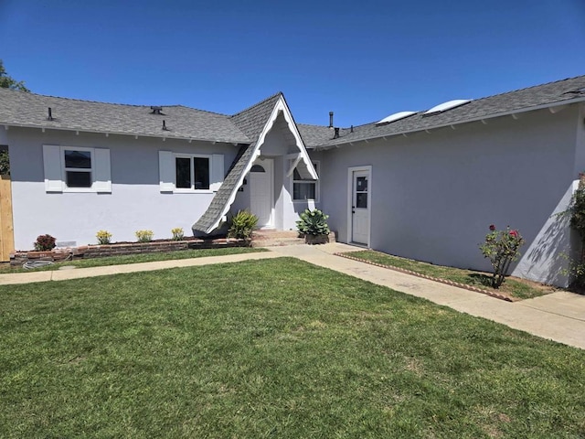 852 5th St, Imperial Beach, CA 91932 - view of front of home featuring stucco siding, a front yard, and a shingled roof