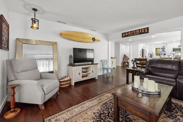 852 5th St, Imperial Beach, CA 91932 - living area with dark wood-style flooring and baseboards