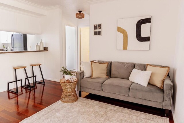 1002 30th St Unit 206, San Diego, CA 92102 - living area featuring wood finished floors, ornamental molding, and baseboards