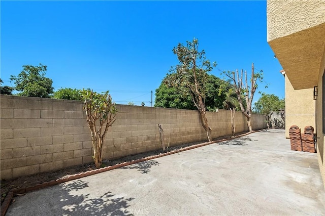 view of patio featuring a fenced backyard