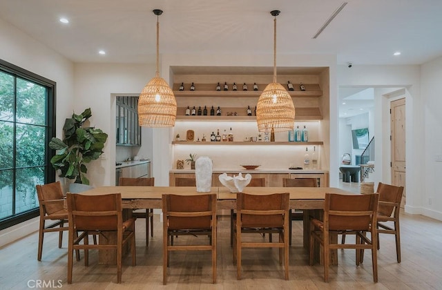 10 Seabluff, Newport Beach, CA 92660 - dining space featuring light wood finished floors and recessed lighting