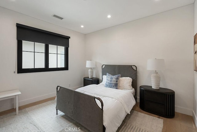 10 Seabluff, Newport Beach, CA 92660 - bedroom featuring wood finished floors, baseboards, and recessed lighting
