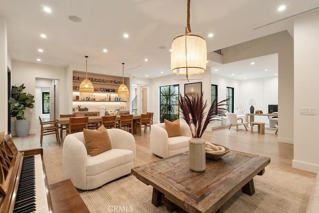 10 Seabluff, Newport Beach, CA 92660 - living area featuring recessed lighting, light wood-style floors, and baseboards