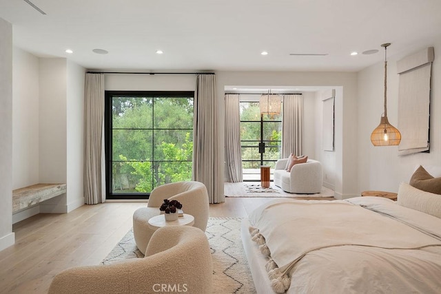 10 Seabluff, Newport Beach, CA 92660 - bedroom with light wood-style floors, recessed lighting, and baseboards