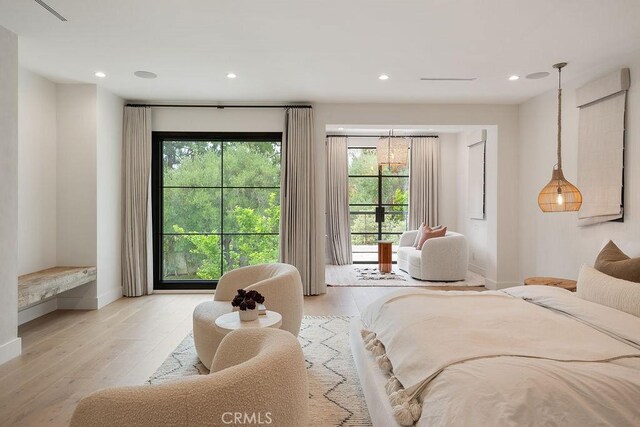 10 Seabluff, Newport Beach, CA 92660 - bedroom featuring light wood-style flooring, recessed lighting, and baseboards