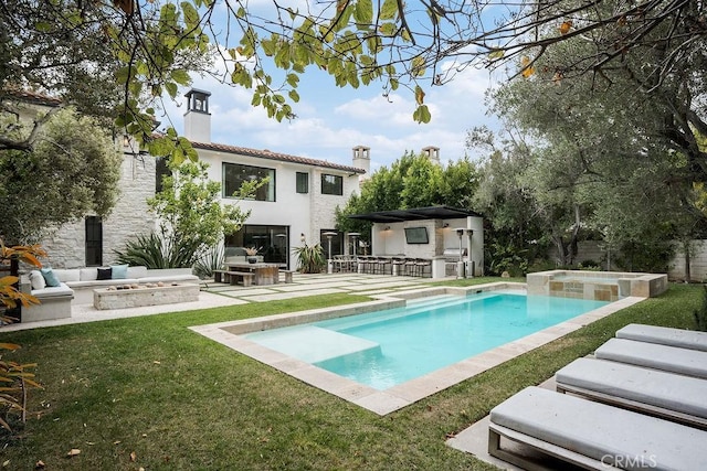 10 Seabluff, Newport Beach, CA 92660 - rear view of house with an in-ground hot tub, a chimney, a patio area, an outdoor pool, and a lawn