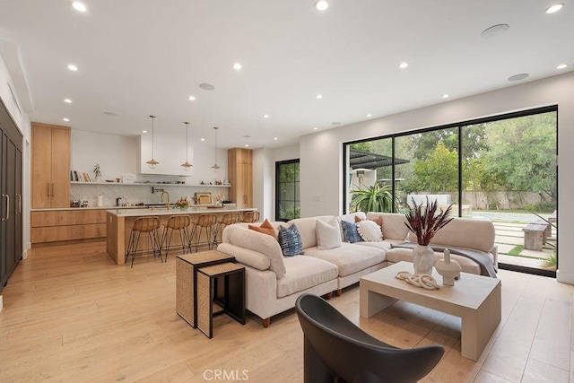 10 Seabluff, Newport Beach, CA 92660 - living area featuring light wood finished floors and recessed lighting