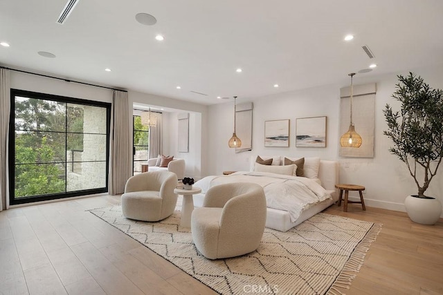 10 Seabluff, Newport Beach, CA 92660 - bedroom featuring hardwood / wood-style flooring, baseboards, and recessed lighting