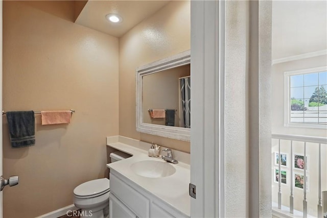 1958 Fall Brook Ct, Merced, CA 95340 - bathroom with toilet, vanity, and crown molding