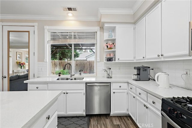 1958 Fall Brook Ct, Merced, CA 95340 - kitchen with stainless steel dishwasher, a sink, crown molding, and white cabinets