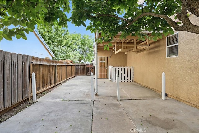 1958 Fall Brook Ct, Merced, CA 95340 - view of patio with a fenced backyard