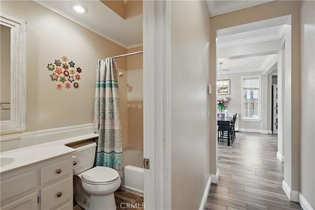 1958 Fall Brook Ct, Merced, CA 95340 - bathroom with crown molding, toilet, baseboards, wood finished floors, and vanity