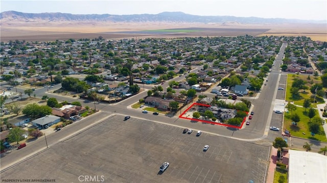 212 N 7th Ave, Avenal, CA 93204 - view of property location with property boundaries highlighted and a mountain backdrop