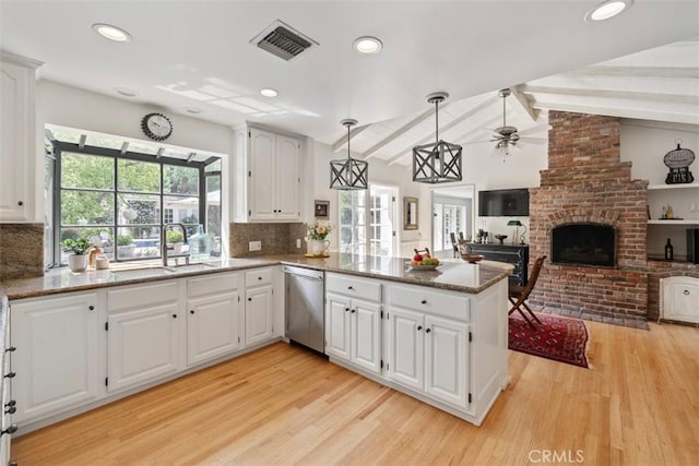 5132 Quakertown Ave, Woodland Hills, CA 91364 - kitchen with dishwasher, light wood-style floors, a peninsula, decorative backsplash, and recessed lighting