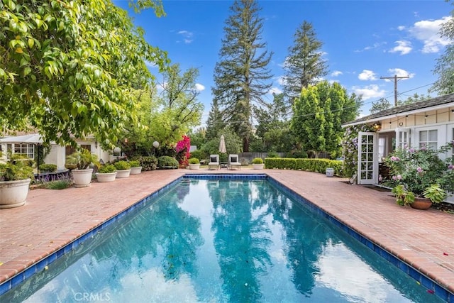 5132 Quakertown Ave, Woodland Hills, CA 91364 - outdoor pool featuring a patio and french doors