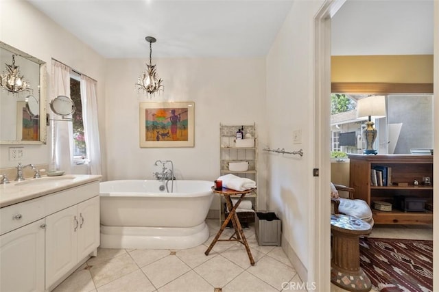 5132 Quakertown Ave, Woodland Hills, CA 91364 - full bath with vanity, a soaking tub, tile patterned floors, and a chandelier