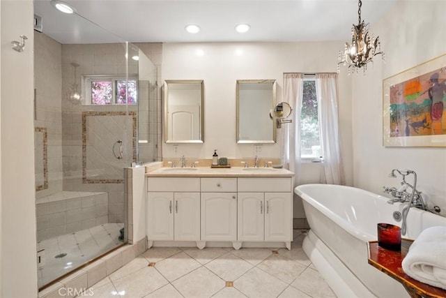5132 Quakertown Ave, Woodland Hills, CA 91364 - bathroom with a soaking tub, a shower stall, double vanity, healthy amount of natural light, and recessed lighting