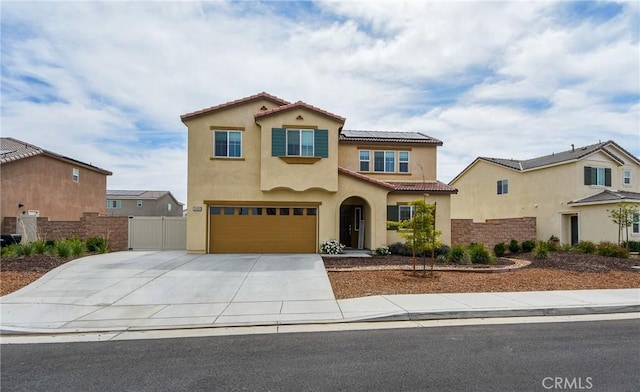 28400 Memory Ln, Winchester, CA 92596 - mediterranean / spanish home featuring a tiled roof, stucco siding, fence, and an attached garage