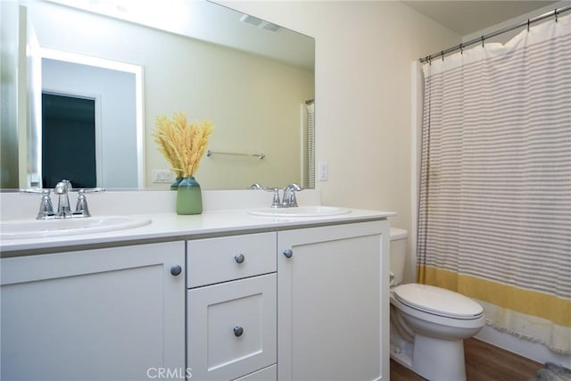 28400 Memory Ln, Winchester, CA 92596 - full bathroom with toilet, double vanity, wood finished floors, and a shower with curtain