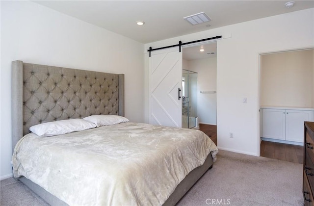 28400 Memory Ln, Winchester, CA 92596 - bedroom featuring carpet, a barn door, a spacious closet, baseboards, and recessed lighting