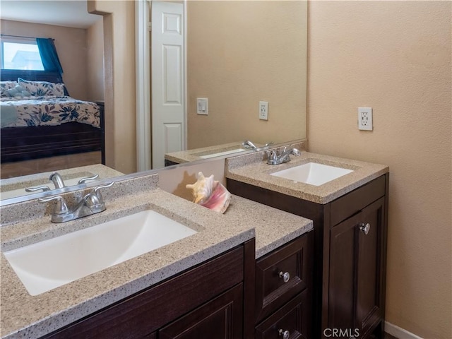 66659 El Dorado Pl, Desert Hot Springs, CA 92240 - ensuite bathroom featuring two vanities