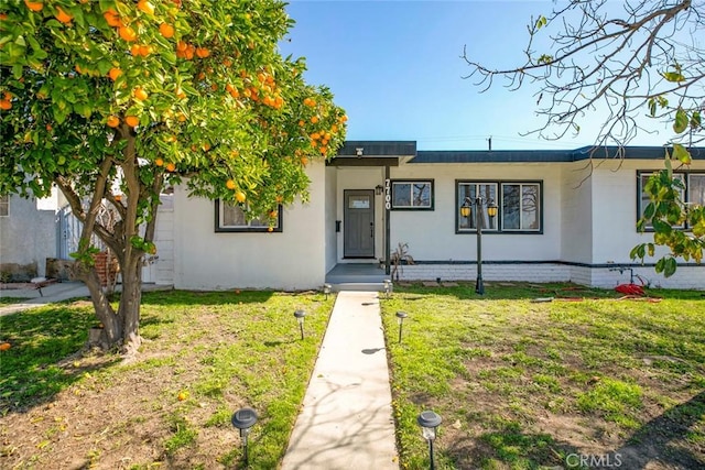 7700 Goodland Ave, North Hollywood, CA 91605 - view of front of house with a front lawn