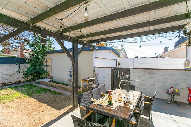 7700 Goodland Ave, North Hollywood, CA 91605 - view of patio with outdoor dining space and a fenced backyard