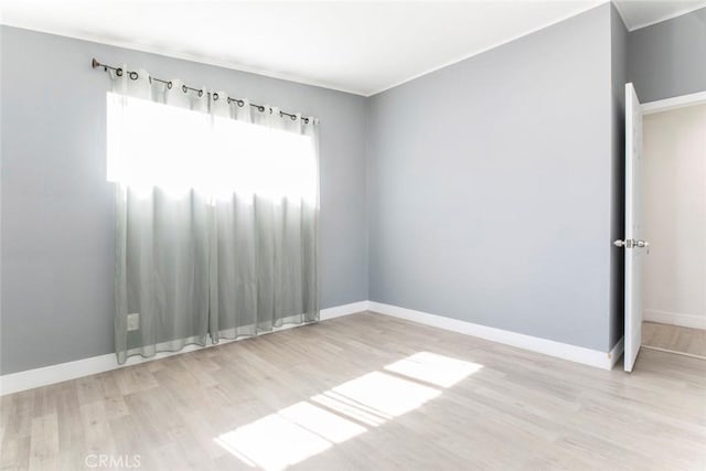 7700 Goodland Ave, North Hollywood, CA 91605 - empty room with wood finished floors and baseboards