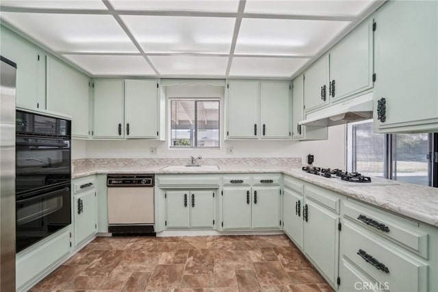 40389 Melrose Ave, Hemet, CA 92544 - kitchen with white appliances, a sink, under cabinet range hood, and stone finish flooring