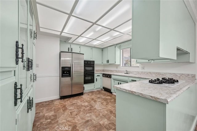 40389 Melrose Ave, Hemet, CA 92544 - kitchen featuring stainless steel refrigerator with ice dispenser, white gas cooktop, dishwashing machine, light countertops, and a sink