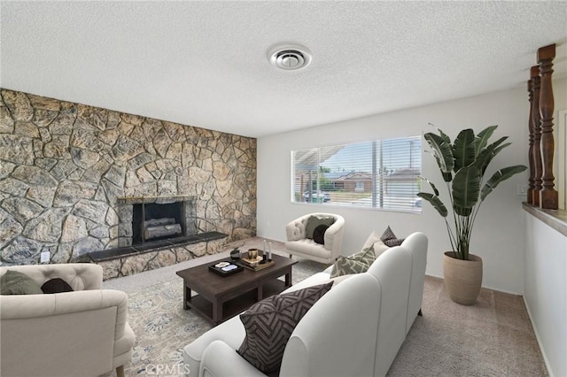 40389 Melrose Ave, Hemet, CA 92544 - living room with a textured ceiling, carpet flooring, and a fireplace