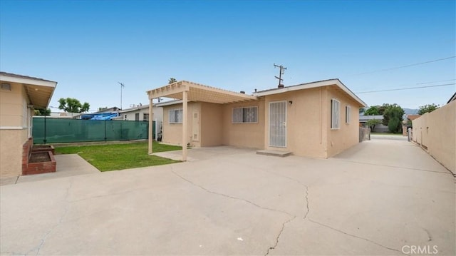 15820 E Queenside Dr, Covina, CA 91722 - rear view of property featuring stucco siding, a fenced backyard, and a patio