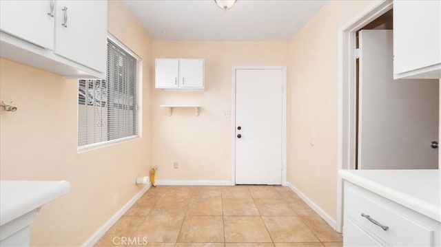 15820 E Queenside Dr, Covina, CA 91722 - laundry room featuring baseboards and light tile patterned flooring