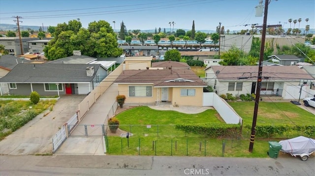 15820 E Queenside Dr, Covina, CA 91722 - view of front of property featuring a gate, a residential view, and stucco siding
