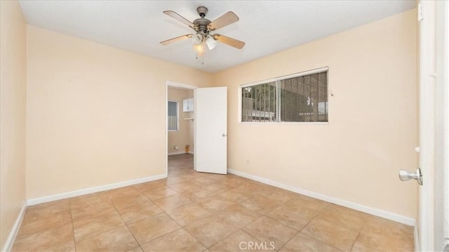 15820 E Queenside Dr, Covina, CA 91722 - empty room with a ceiling fan, baseboards, and light tile patterned floors