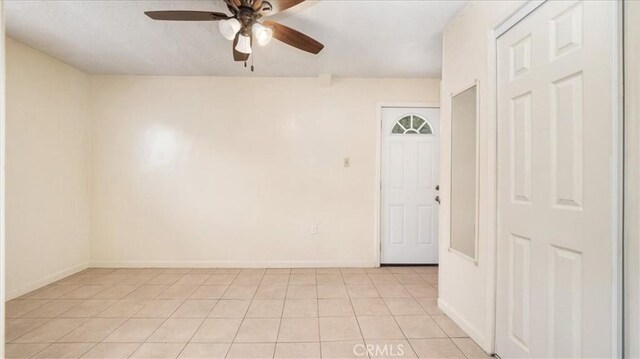 15820 E Queenside Dr, Covina, CA 91722 - empty room featuring ceiling fan, light tile patterned floors, and baseboards
