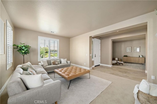 45133 Fieldbrook Ct, Temecula, CA 92592 - living area with baseboards and light colored carpet