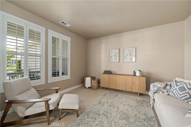 45133 Fieldbrook Ct, Temecula, CA 92592 - living area featuring light carpet and baseboards