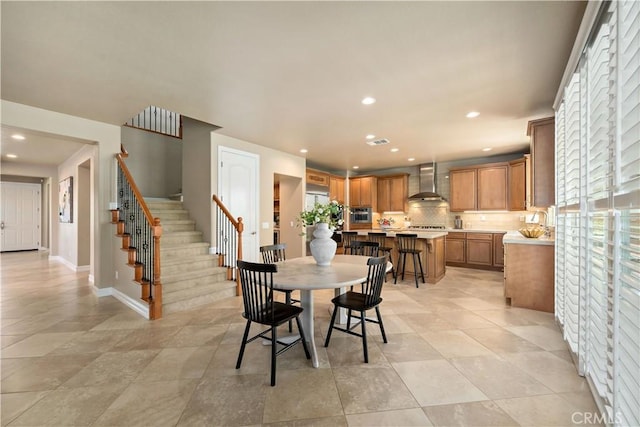 45133 Fieldbrook Ct, Temecula, CA 92592 - dining space with stairs, recessed lighting, and baseboards