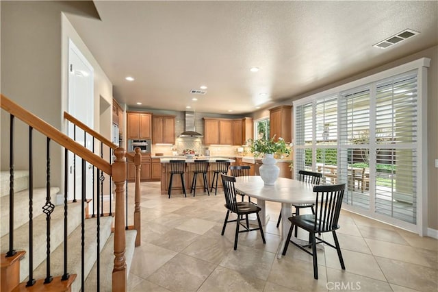 45133 Fieldbrook Ct, Temecula, CA 92592 - dining space with recessed lighting, stairway, light tile patterned floors, and baseboards