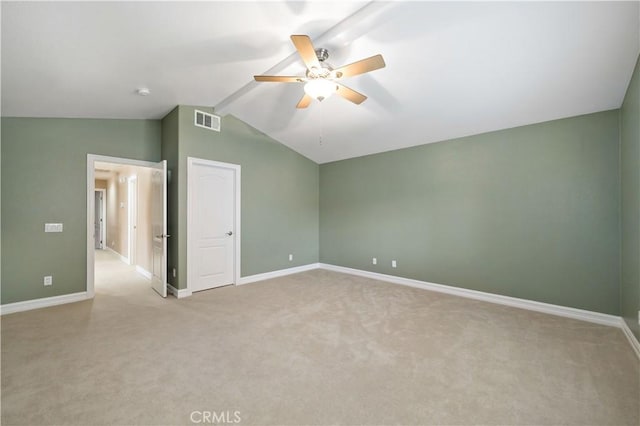45133 Fieldbrook Ct, Temecula, CA 92592 - empty room featuring a ceiling fan, vaulted ceiling, light carpet, and baseboards