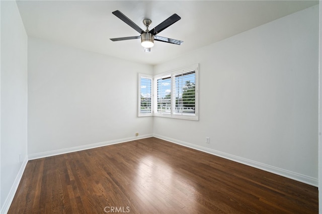 15408 Mottley Dr, La Mirada, CA 90638 - empty room featuring dark wood finished floors, baseboards, and ceiling fan