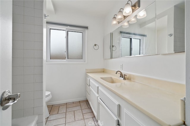 15408 Mottley Dr, La Mirada, CA 90638 - full bath featuring toilet, vanity, and baseboards