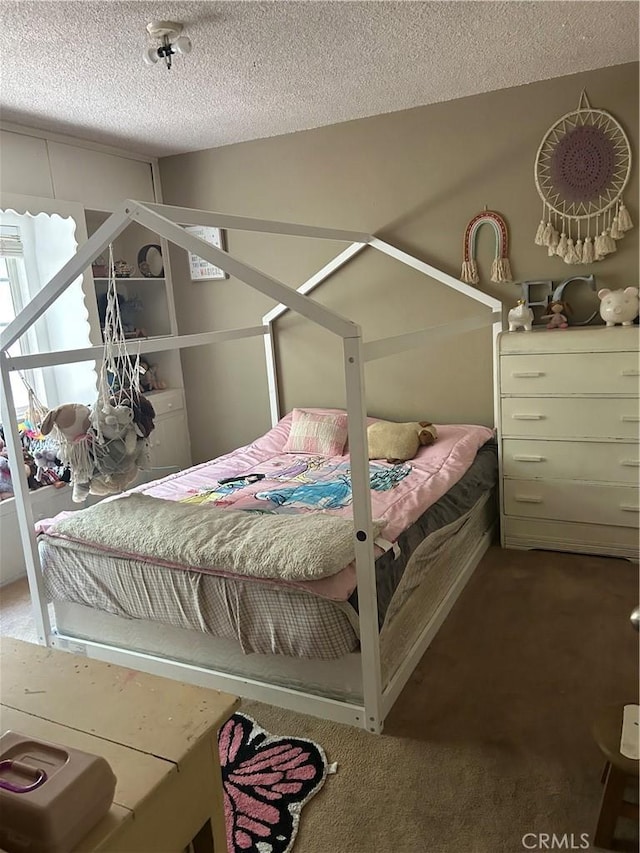 8900 Geyser Ave, Northridge, CA 91324 - bedroom featuring carpet and a textured ceiling