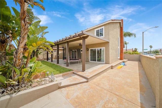 11396 Burl Dr, Fontana, CA 92337 - rear view of house featuring ceiling fan, a patio, and stucco siding