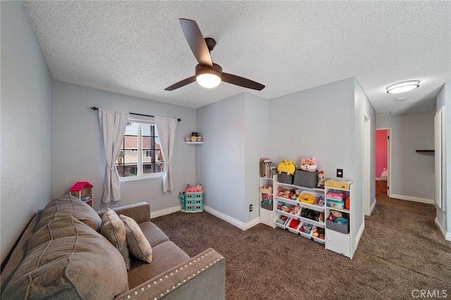 11396 Burl Dr, Fontana, CA 92337 - playroom with a textured ceiling, ceiling fan, carpet, and baseboards