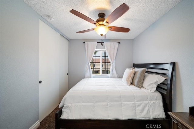 11396 Burl Dr, Fontana, CA 92337 - bedroom with carpet, a textured ceiling, and ceiling fan