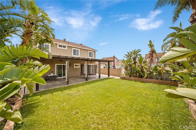 11396 Burl Dr, Fontana, CA 92337 - rear view of property with stucco siding and a patio