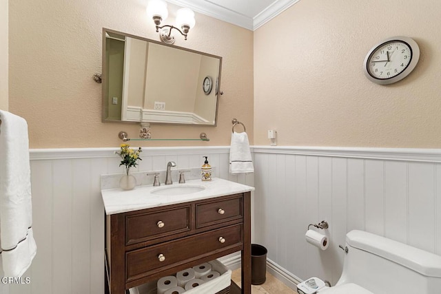 6228 Watertree Ct, Agoura Hills, CA 91301 - half bath featuring toilet, vanity, wainscoting, and crown molding