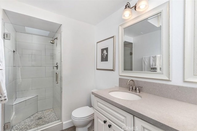 33926 La Serena Dr Unit 7, Dana Point, CA 92629 - bathroom with vanity, toilet, and a shower stall